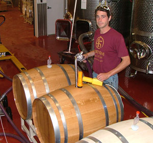 Shawn-Walters-filling-barrels at Forty-Five North Winery